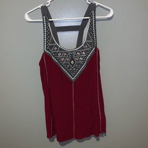 Super cute magenta tank top with tribal "V" neck